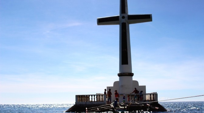 Boat docking at marker of Sunken Cemetery, Camiguin