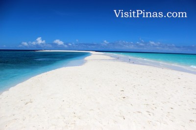 Sandbar slowly going underwater at White Island, Camiguin